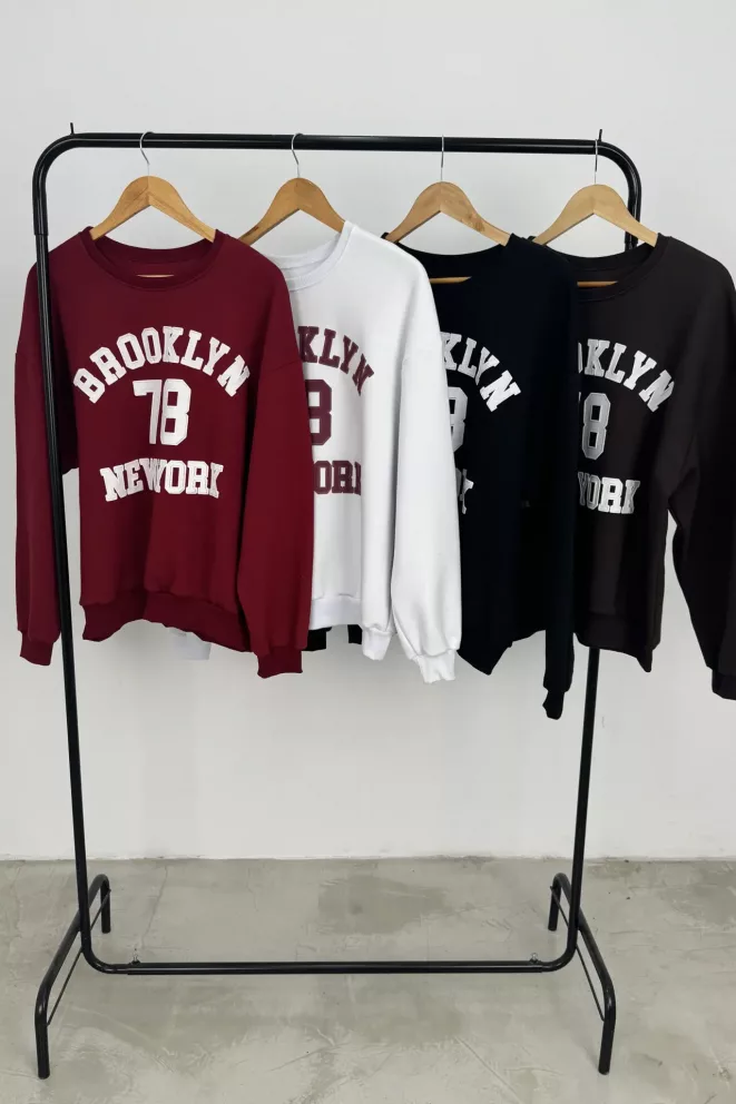 B101 - Buzo Brooklyn Estampado Delantero Friza
