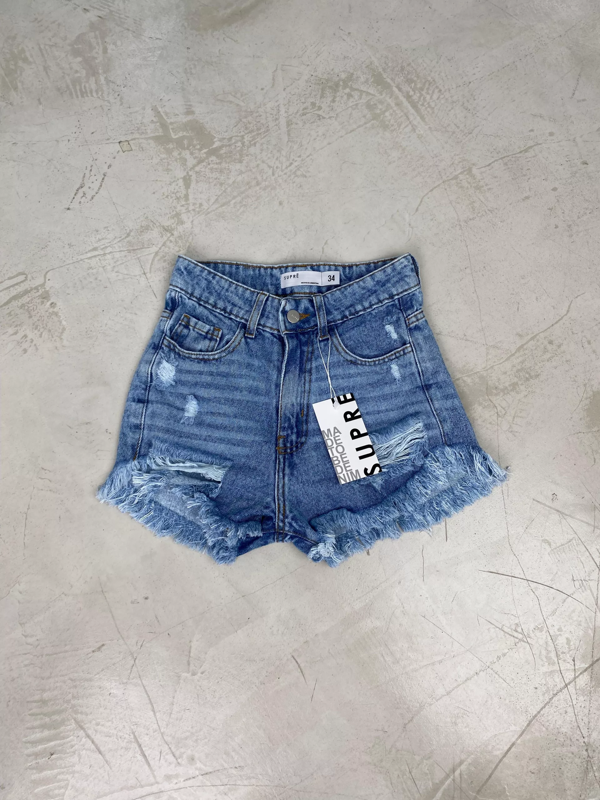 SD448 - Short Denim Celeste Rígido Desflecado Con Roturas (Eden)